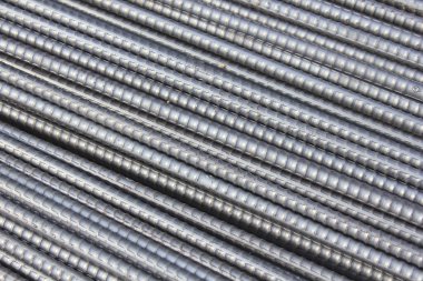 Yığılmış metal çelik çubuklar desenli endüstriyel yüzey desenlerini gösteriyor