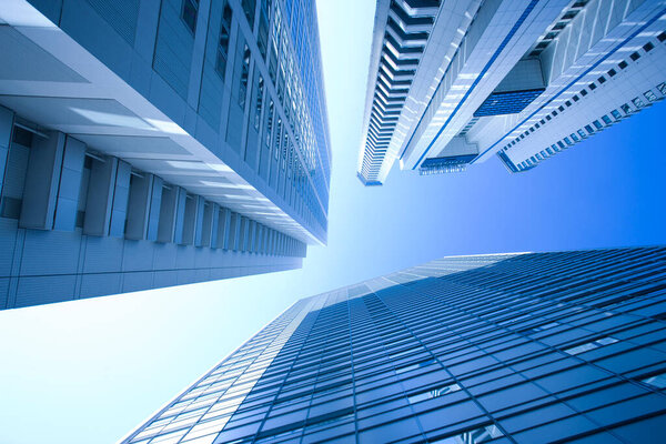 skyscrapers in the city over blue sky 