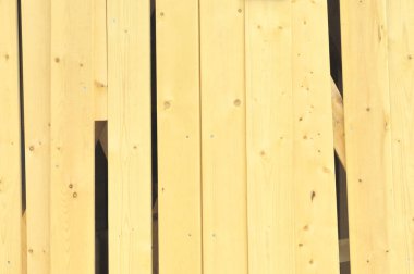 Dikey ahşap tahtalar kırsal arka plan çitleri oluşturuyor.