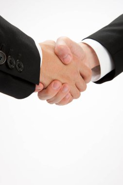 İki iş adamının el sıkışması başarılı oldu. 