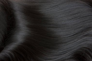 Brunette or black hair. Female long dark hair in black. Beautifully laid curls clipart