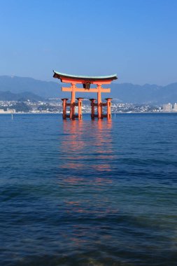 Miyajima, Hiroshima, Japan at the floating gate of Itsukushima Shrine clipart