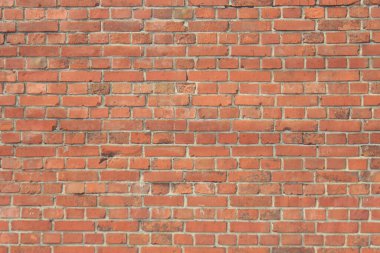  Kırmızı tuğlalı bir duvar. dokunun arkaplanı
