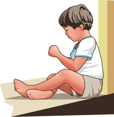 Küçük Asyalı çocuk yerde oturuyor.