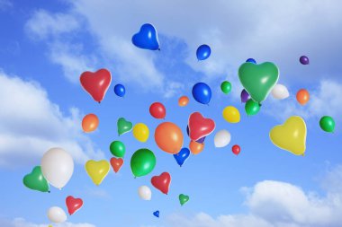 mavi gökyüzünde uçan çok renkli balonlar                  