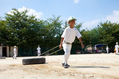 Japonya 'da beyzbol oynayan Japon gençler