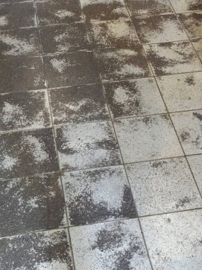 Kirli asfalt döşemeler arka planda, kapatın