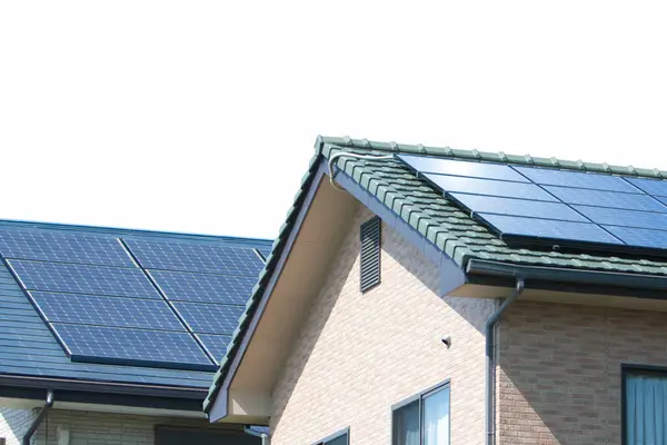 solar panels on roofs of the houses