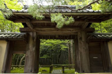 wooden gate with a japanese garden