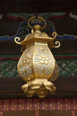 the golden lamp in the temple