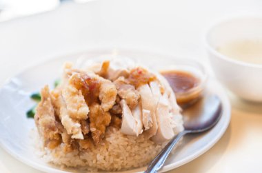 Serving delicious chicken rice dish