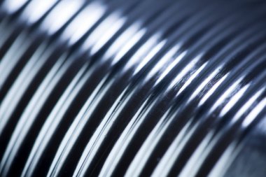 Metal spiral arkaplanın yakın görüntüsü. makro.      