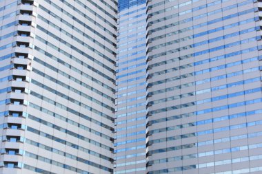 Gökdelenleri ve şehir arkaplanı olan şehir manzarası 