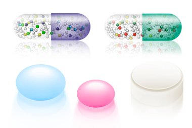 Beyaz arka planda çeşitli renkli hapların yakın plan görüntüsü.                   