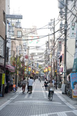 People walking on old street at day time