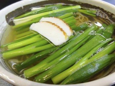 Enjoying delicious bowl of noodles