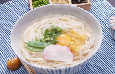 Enjoying delicious bowl of noodles