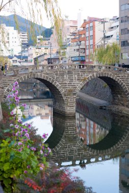Megane Bridge (Spectacles Bridge) in Nagasaki, Japan over the Nakashima River  clipart