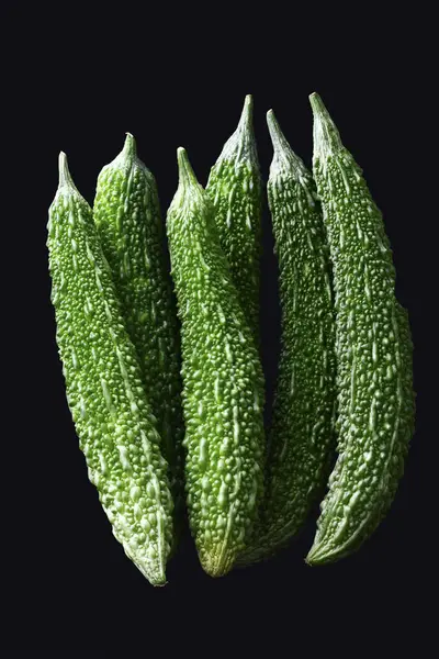 Färska Gröna Bitter Meloner Bakgrunden Närbild — Stockfoto