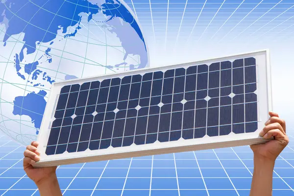 solar panel in hands and globe on background