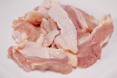 Arka planda çiğ tavuk eti, kapatın.