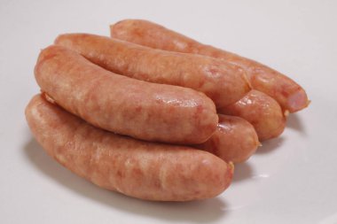 Arka planda bir grup lezzetli sosis, kapatın.