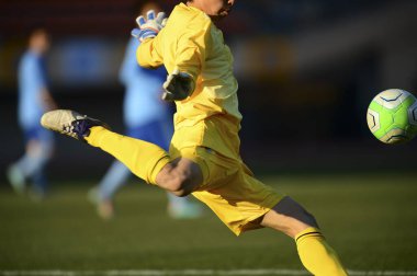 Asyalı futbolcuların yan görünümü 