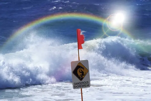 sign of the rainbow and a wave of the sea