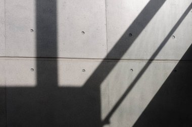 Beton bloklar, gölgeler ve güneş ışığıyla soyut arkaplan