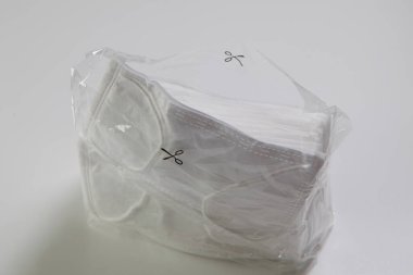 Bir arka planda yüz maskesi yığını, kapat