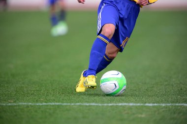 Stadyumda futbolcu aksiyonu