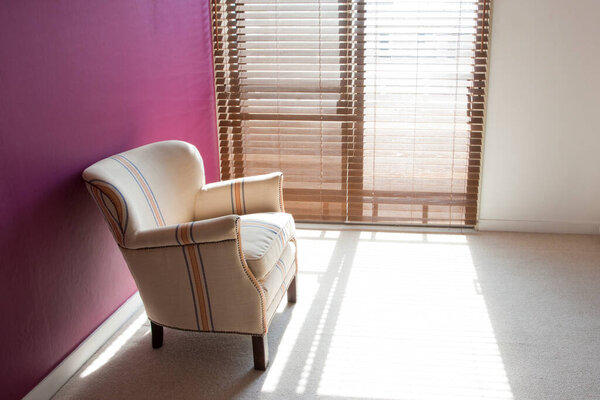 interior shot of beautiful modern house with stylish armchair