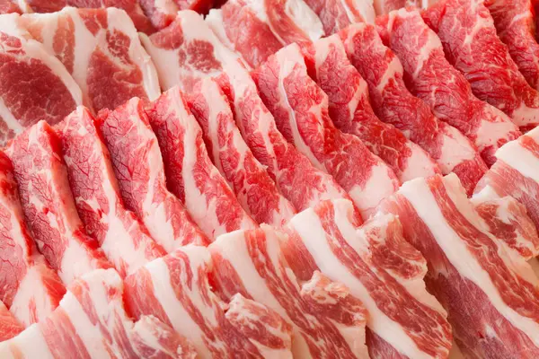 生牛肉片的特写 肉类背景 — 图库照片