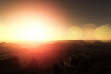 Güneş bir dağ sırasının üzerinde parlak bir şekilde batıyor.    