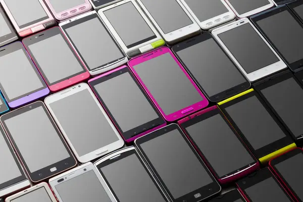 Modern Mobile Phones Different Colors Dark Background — Stock Photo, Image