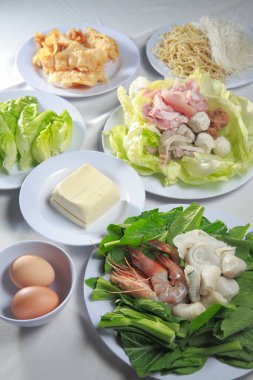 Arranging fresh ingredients for cooking