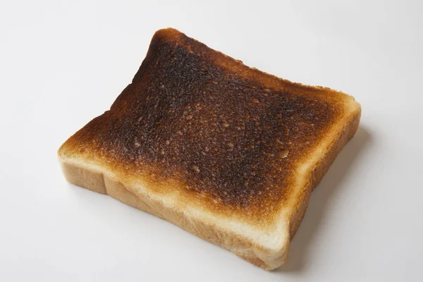 Slice Bread Burnt Out White Background — Stock Photo, Image