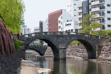 Megane Bridge (Meganebashi or Spectacles Bridge) over the Nakashima River in Nagasaki, Japan clipart