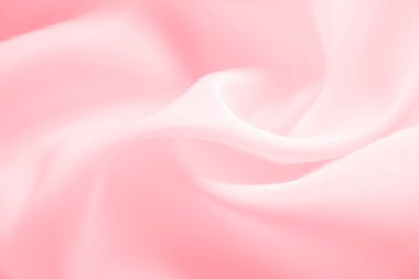 İpek desenli soyut pembe kumaş. arkaplan olarak kullanılabilir