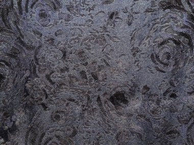 Girdap desenleri ve tasarımları gösteren desenli yüzey