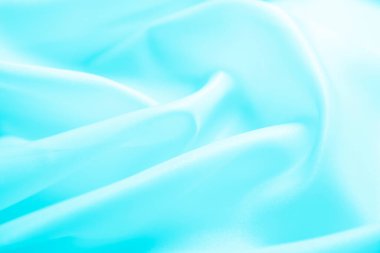 pürüzsüz mavi ipek ya da saten lüks kumaş arka plan. Lüks arkaplan tasarımı