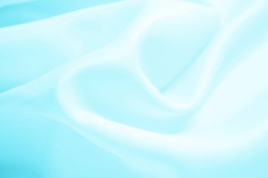 pürüzsüz mavi ipek ya da saten lüks kumaş arka plan. Lüks arkaplan tasarımı