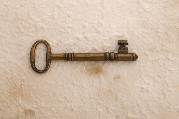 vintage key on wall surface