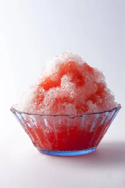Cold shaved ice on background, close up