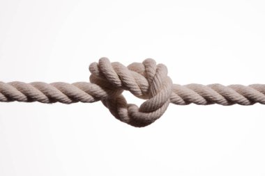 Düğüm izole edilmiş beyaz halatı yakın çekim