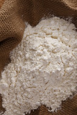 Çuval arkaplanda beyaz un, kapat