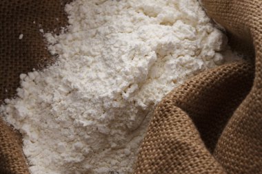 Çuval arkaplanda beyaz un, kapat