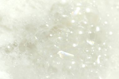 Beyaz arka planda beyaz köpük.