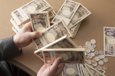 Japon Yen banknot yığını, finans kavramı geçmişi 