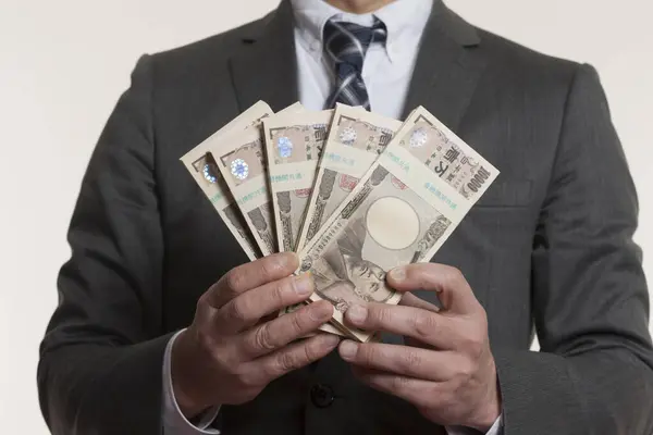 Mãos Homem Segurando Dinheiro Japonês Notas Iene — Fotografia de Stock